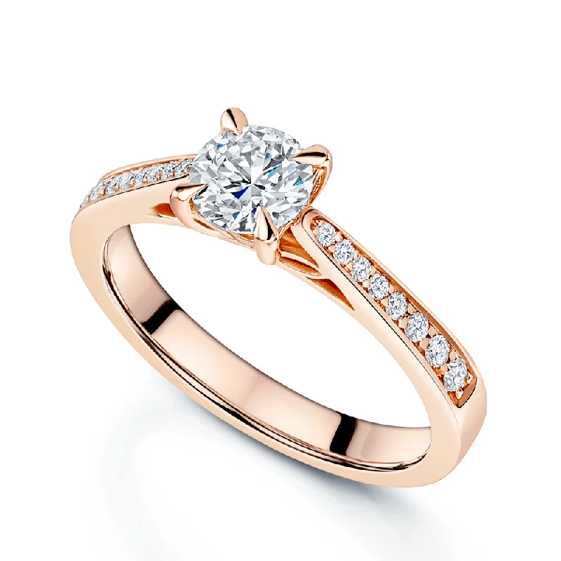 women’s side-stone engagement rings-18ct Rose Gold GIA Certificated 0.63 Carat Round Brilliant Cut Diamond Ring With Diamond Shoulders