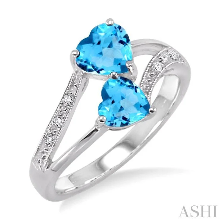 women’s heirloom engagement rings-5&6 mm Heart Shape Blue Topaz and 1/50 Ctw Single Cut Diamond Ring in Sterling Silver