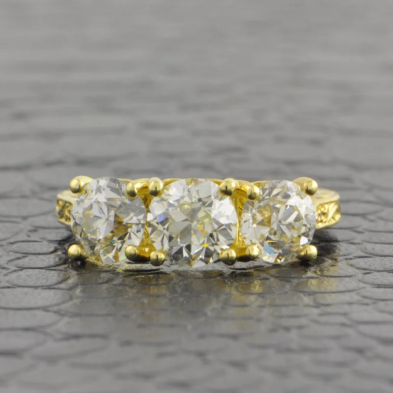 women’s affordable diamond engagement rings-Vintage Inspired Three Stone Old European Cut Diamond Ring in 18k Yellow Gold