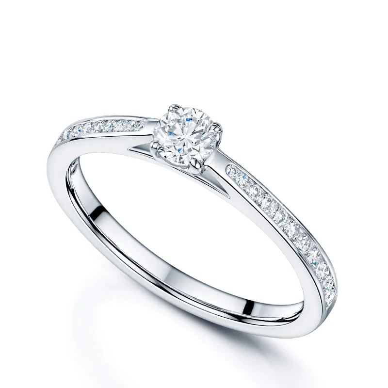 women’s custom engagement rings-18ct White Gold Round Brilliant Cut Diamond Ring With Diamond Set Shoulders