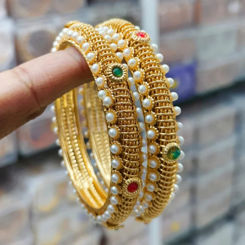 women’s pearl chain bracelets-Pooja Bangles Gold Plated Pearl Bangles Set