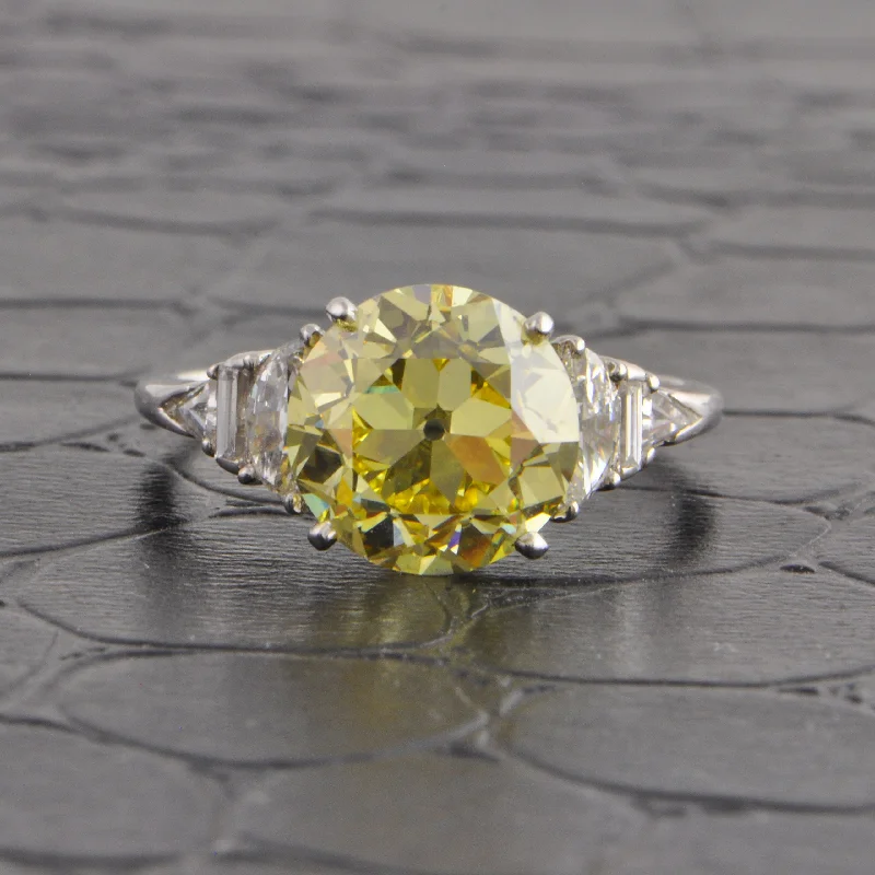 women’s matching wedding and engagement rings-GIA 3.15 ct. Fancy Intense Yellow Old European Cut Diamond Ring in Platinum