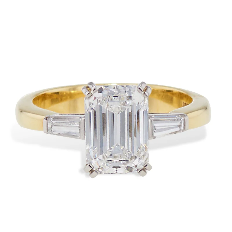 women’s alternative engagement rings-Tiffany & Co Circa 1990 Yellow Gold and Platinum Emerald Cut Diamond Ring