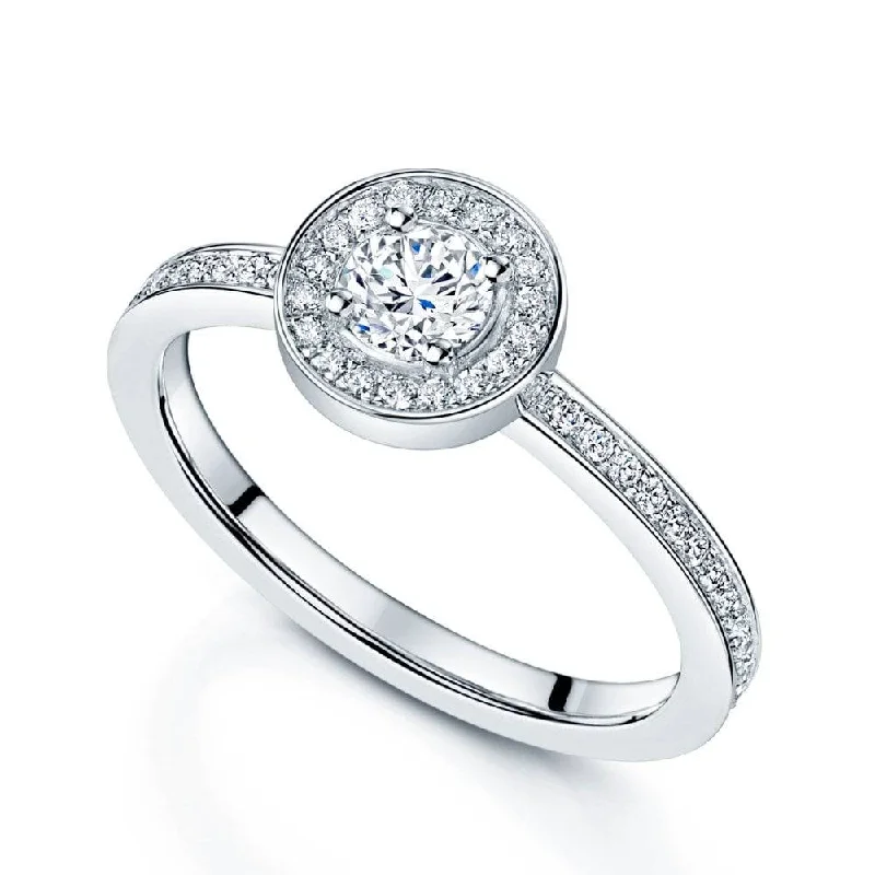 women’s traditional engagement rings-Platinum Round Brilliant Cut Diamond Ring With Diamond Halo and Channel Set Shoulders