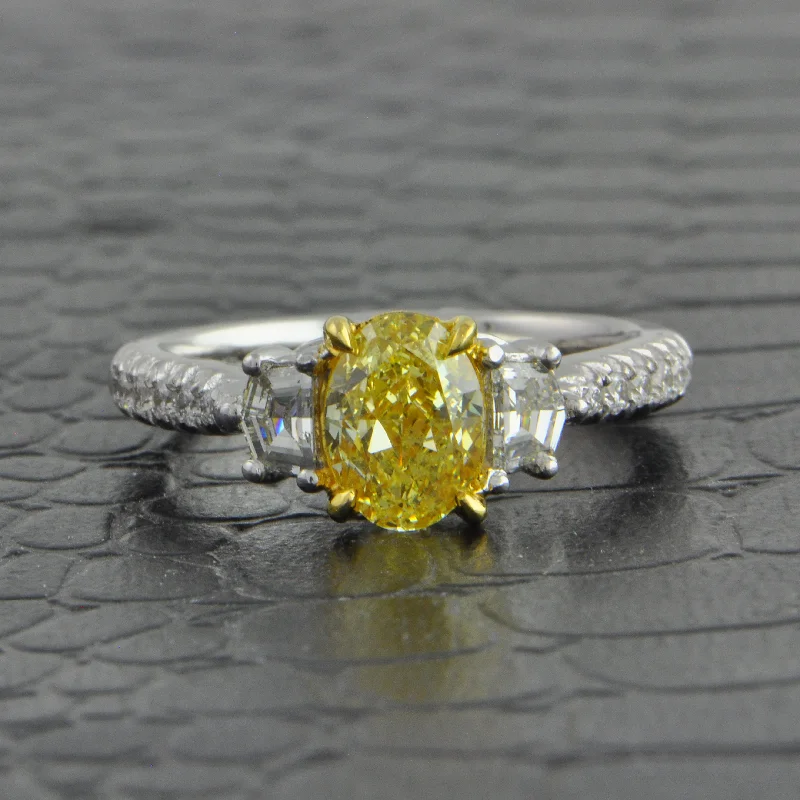 women’s ruby engagement rings-1.27 ct. Fancy Yellow Oval Cut Diamond Ring in Platinum and 18k Yellow Gold