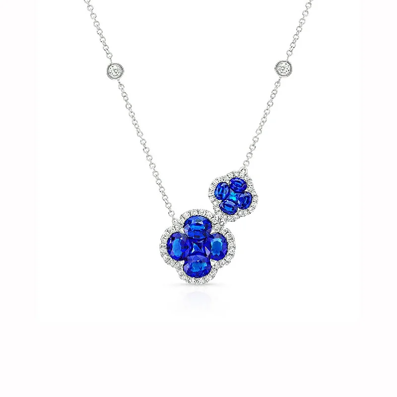 women’s sapphire necklaces-Oval Blue Sapphire and Diamond Halo Necklace