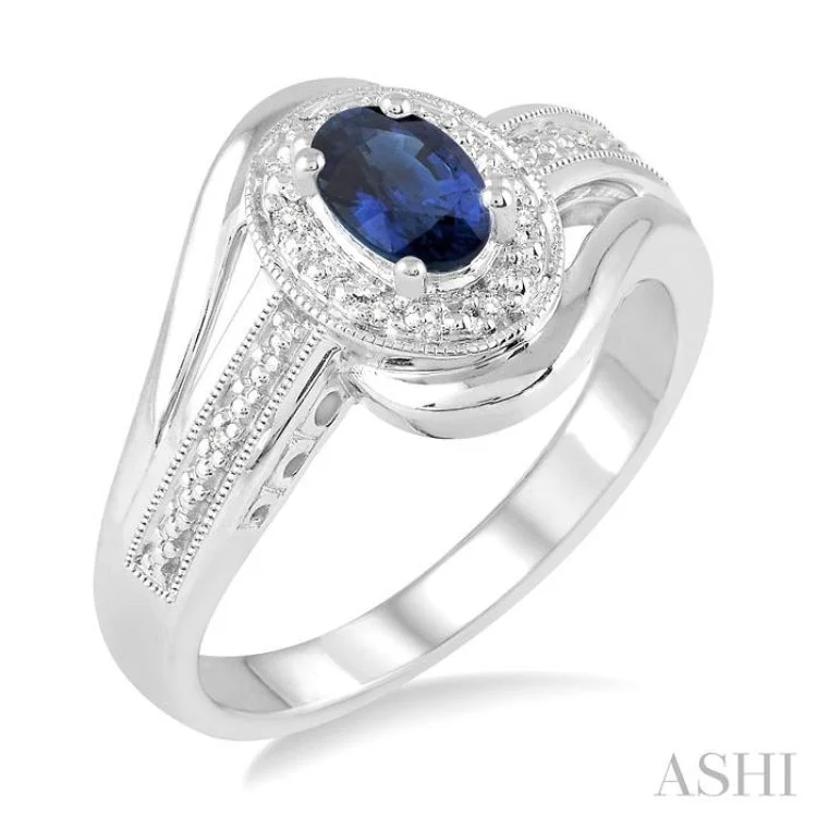 women’s custom engagement rings-6x4 MM Oval Cut Sapphire and 1/50 Ctw Round Cut Diamond Ring in Sterling Silver