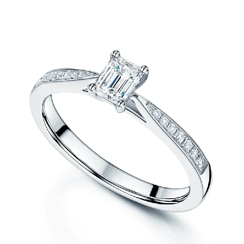 women’s luxury engagement rings-Platinum GIA Certificated 0.50ct Emerald Cut Diamond Ring With Diamond Set Shoulders