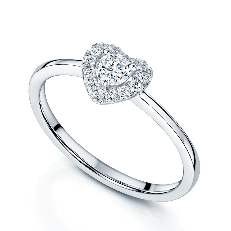 women’s heirloom engagement rings-Platinum Heart Shaped Diamond Ring With Halo Surround