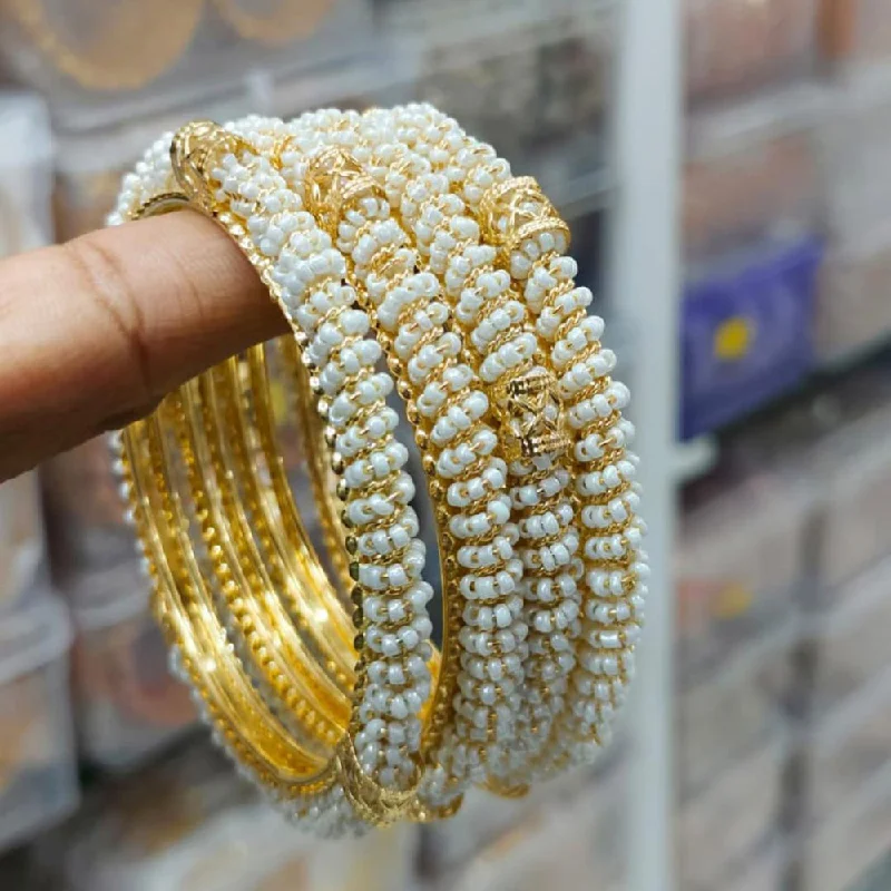 women’s designer bangles-Pooja Bangles Gold Plated Pearl Bangles Set